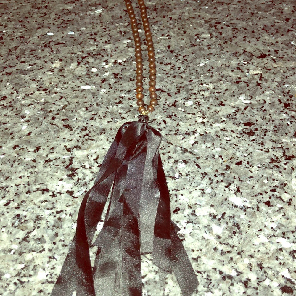 Boutique beaded fabric necklace . Brand new